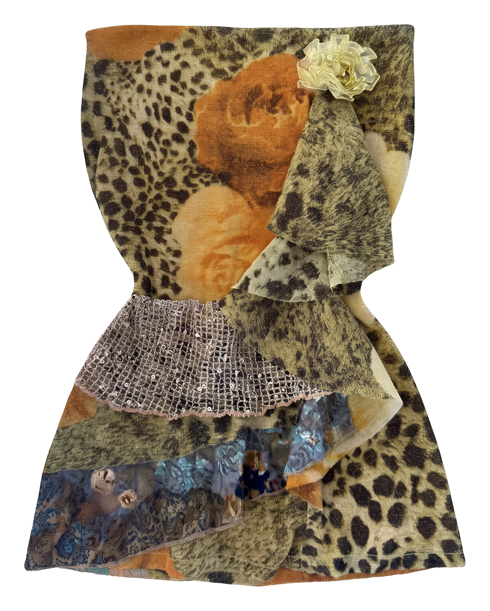 Vintage leopard print layered ruffle top laid out on a table